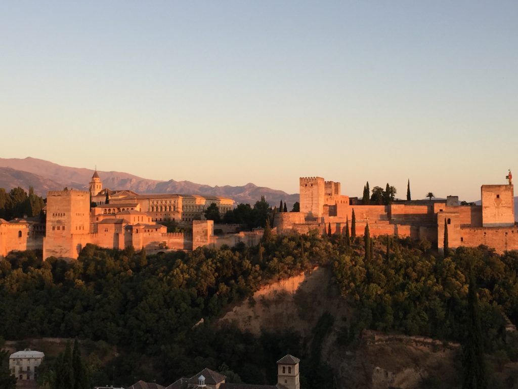 Sunset over Alhambra in Granada, Spain - Photo by Outside Suburbia