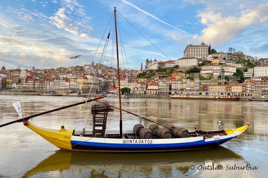 A Rabelo boat bopping in the water in Duoro river in Porto, Portugal