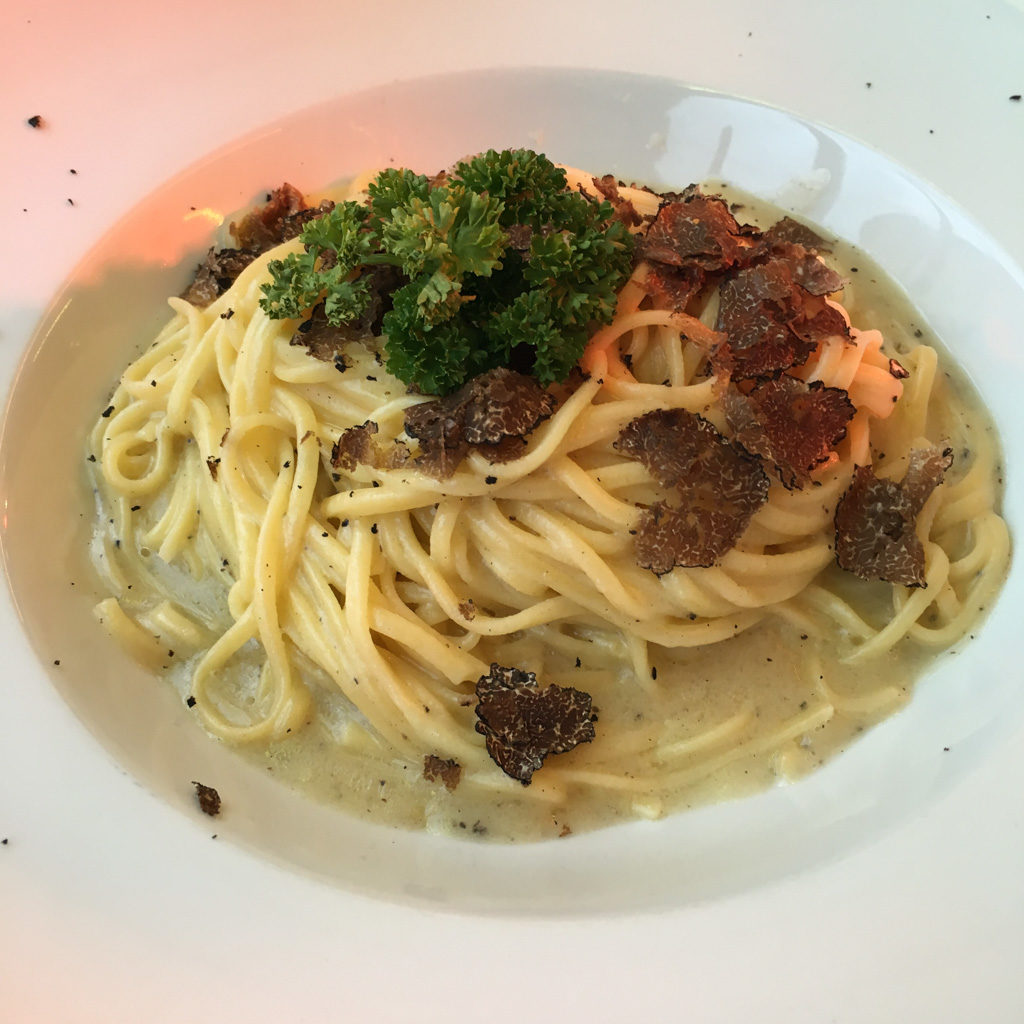 A bowl of bucatini with shaved truffles | Outside Suburbia