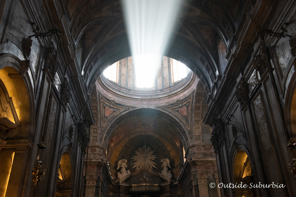 Light beams in through the rose windows at the Sé Cathedral | Outside Suburbia