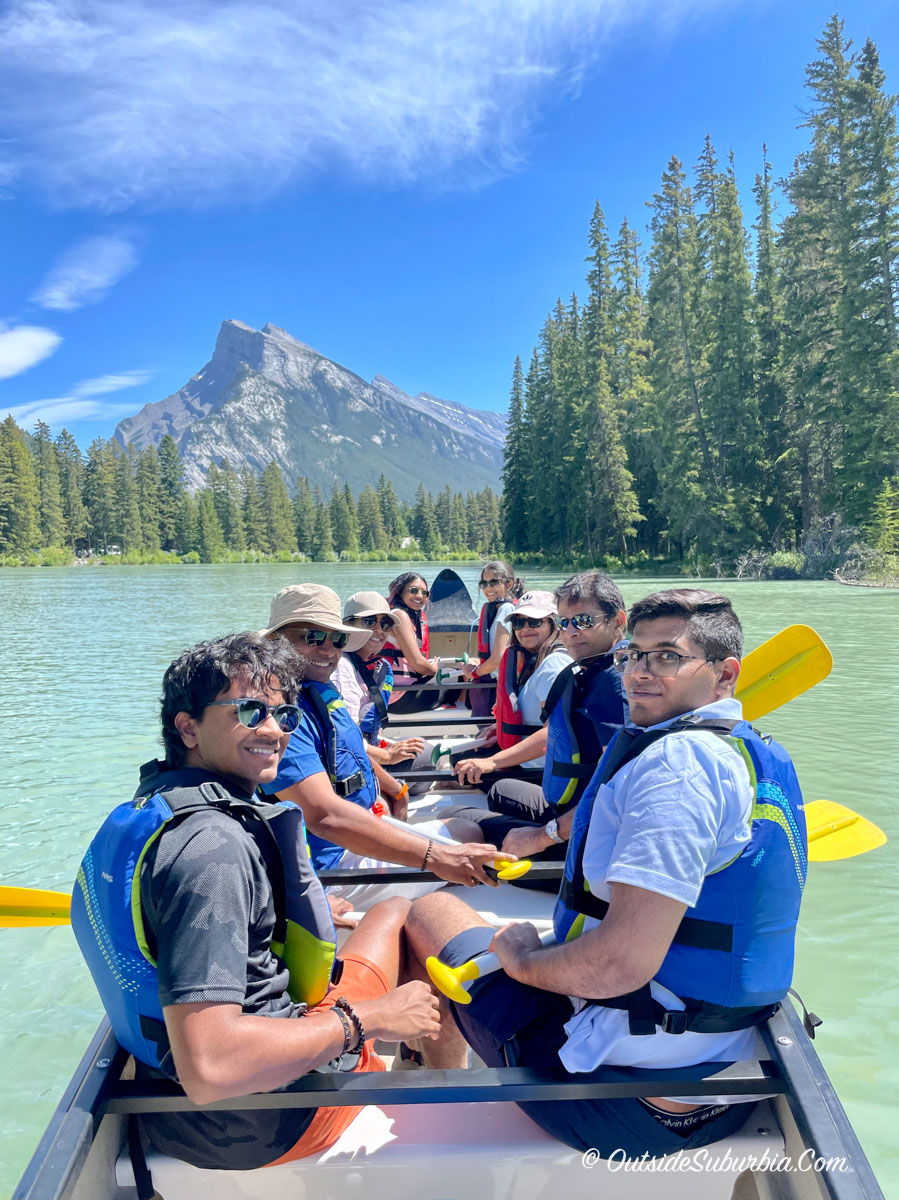 Canoe on the Bow River in Banff with Mount Rundle in view